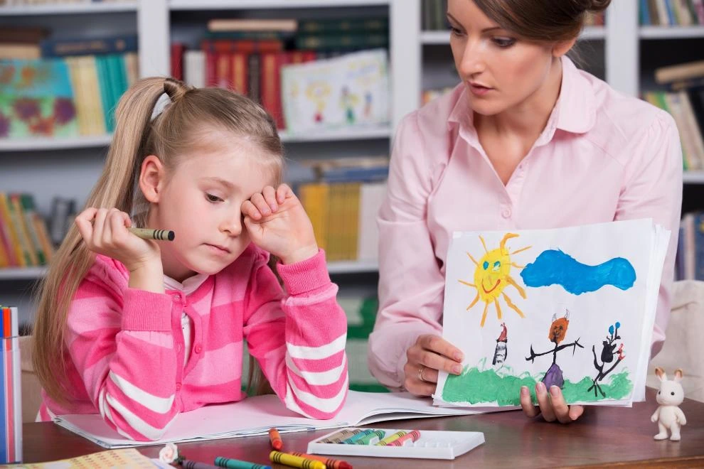 Child psychologist in Lahore providing child counseling therapy through art-based activities to help a young girl express emotions, improve behavior, and support healthy emotional development.