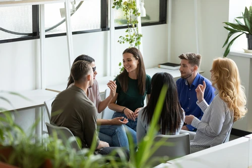 Psychology students participating in a supervised group discussion during a clinical psychology internship program at Care & Cure Wellness Center in Lahore.